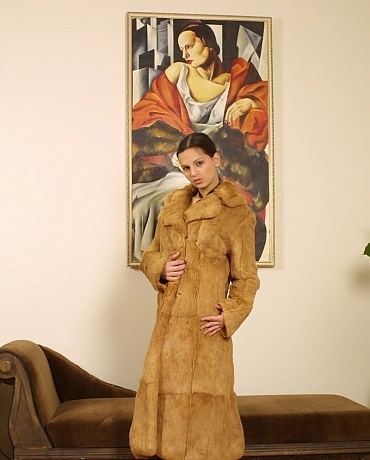 Eva in a full length fur coat