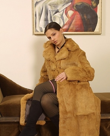 Eva in a full length fur coat