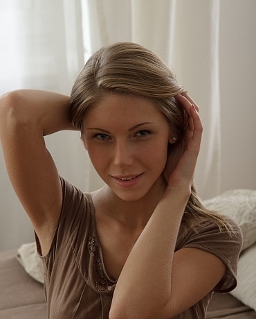 Anjelica has brown stockings on
