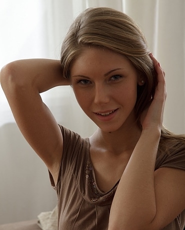 Anjelica has brown stockings on