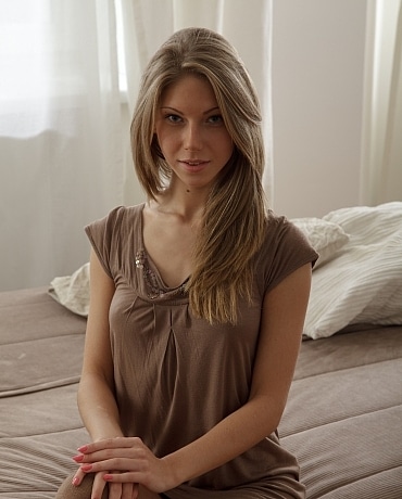 Anjelica has brown stockings on