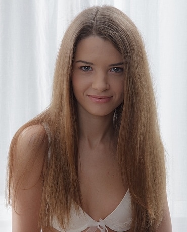 Tini with matching white bra and panties